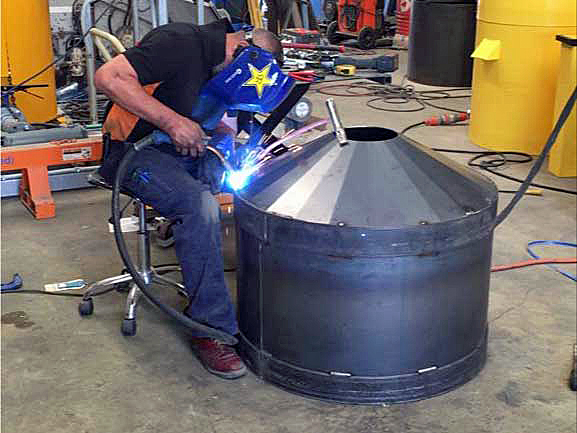 WAGS fabricator welding a single bowl