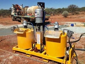 Hired high pressure geo-grouter grout pump unit actively pumping on mining site
