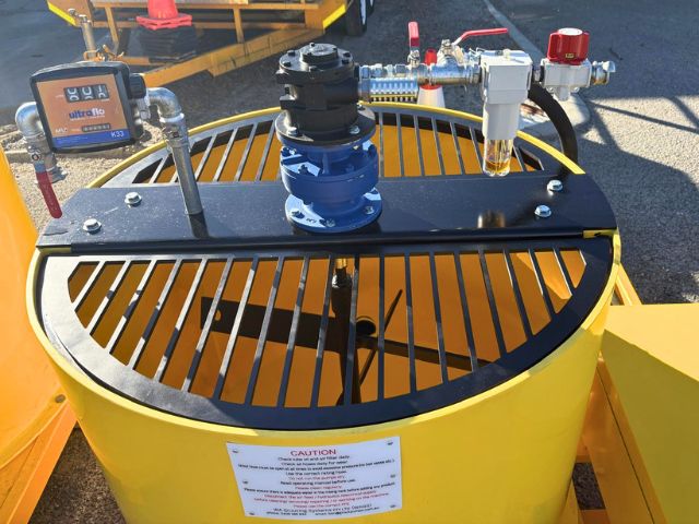 Pneumatic drive and safety grate on a yellow 1000 litre poly paddle mixer