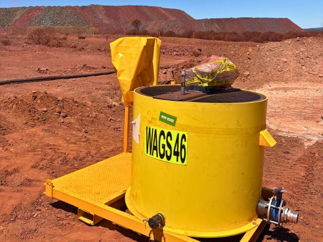 Yellow WAGS 1000 litre poly paddle mixer at a Western Australian mine site